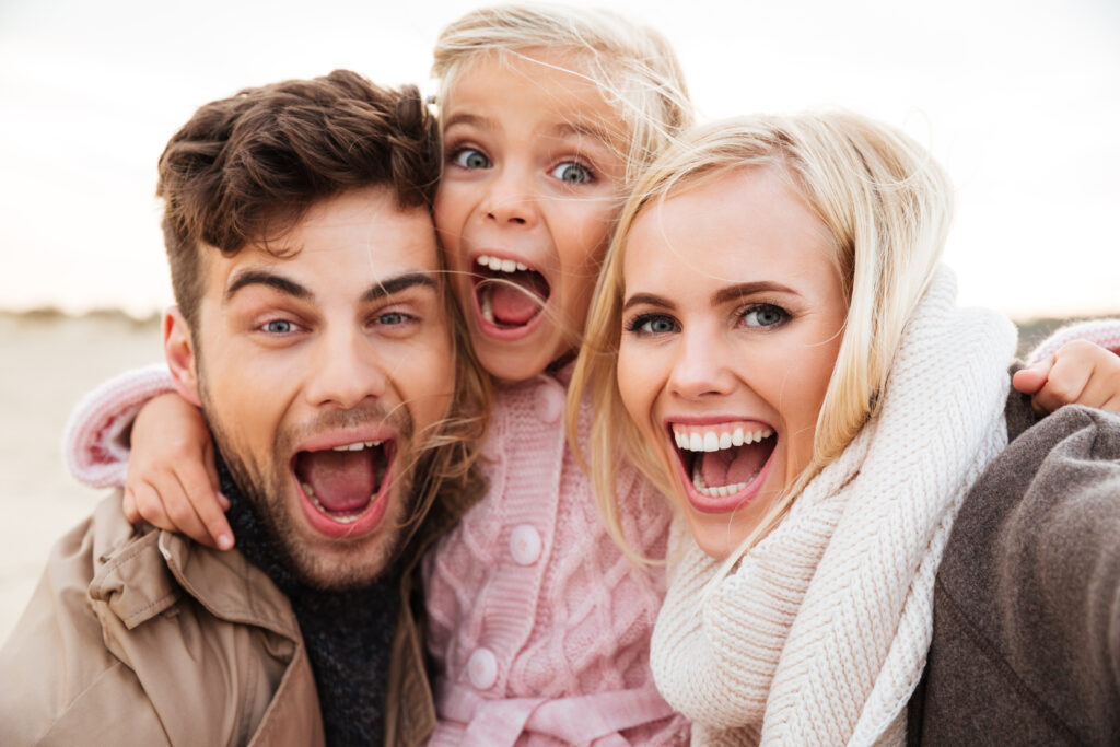 happy family after treatment at harter family dental