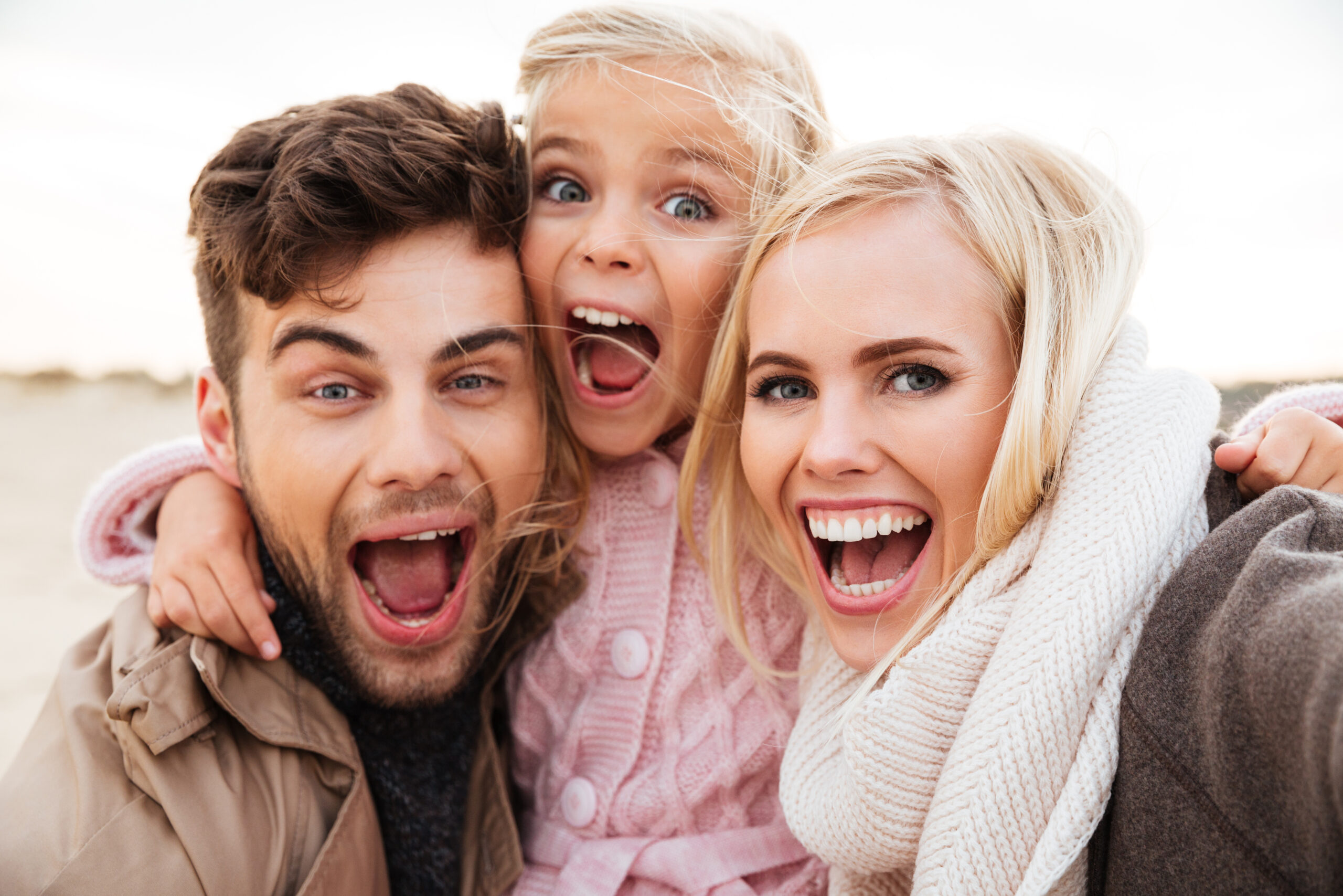 happy family after treatment at harter family dental